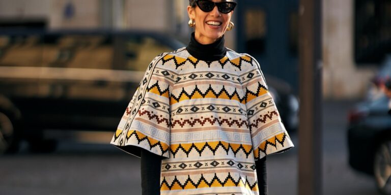 موضة الأحذية العالية حتى الركبة لمسة كلاسيكية مع منسقة أزياء “هي” الخاصة